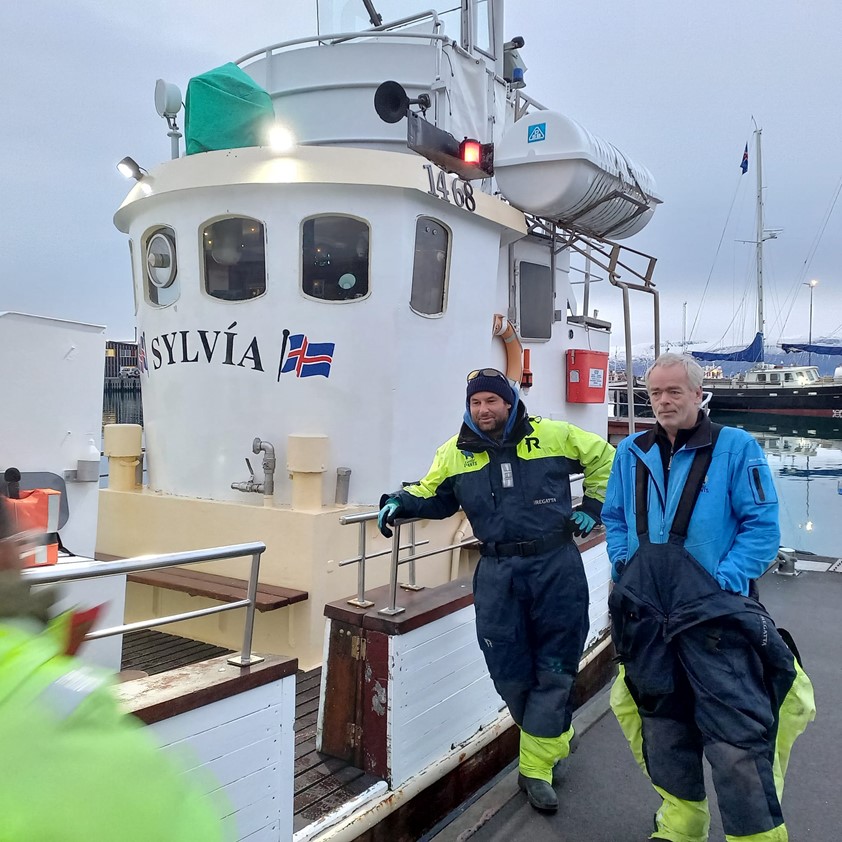 Whale watching oak boat Sylvia leaving Husavik harbour for maintenance journey