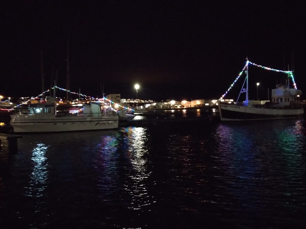 Christmas lights on whale watching boats from Húsavík